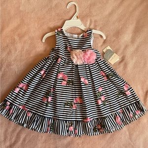 Navy and white striped dress with pink flowers. Size 2T